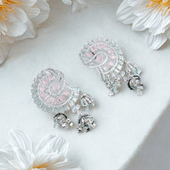 Stunning chandelier-style drop earrings featuring pink quartz stones surrounded by brilliant cubic zirconia in a sophisticated fan pattern