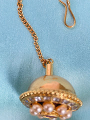 Elegant Round Kundan Pearl Maang Tikka with Ruby Centerpiece