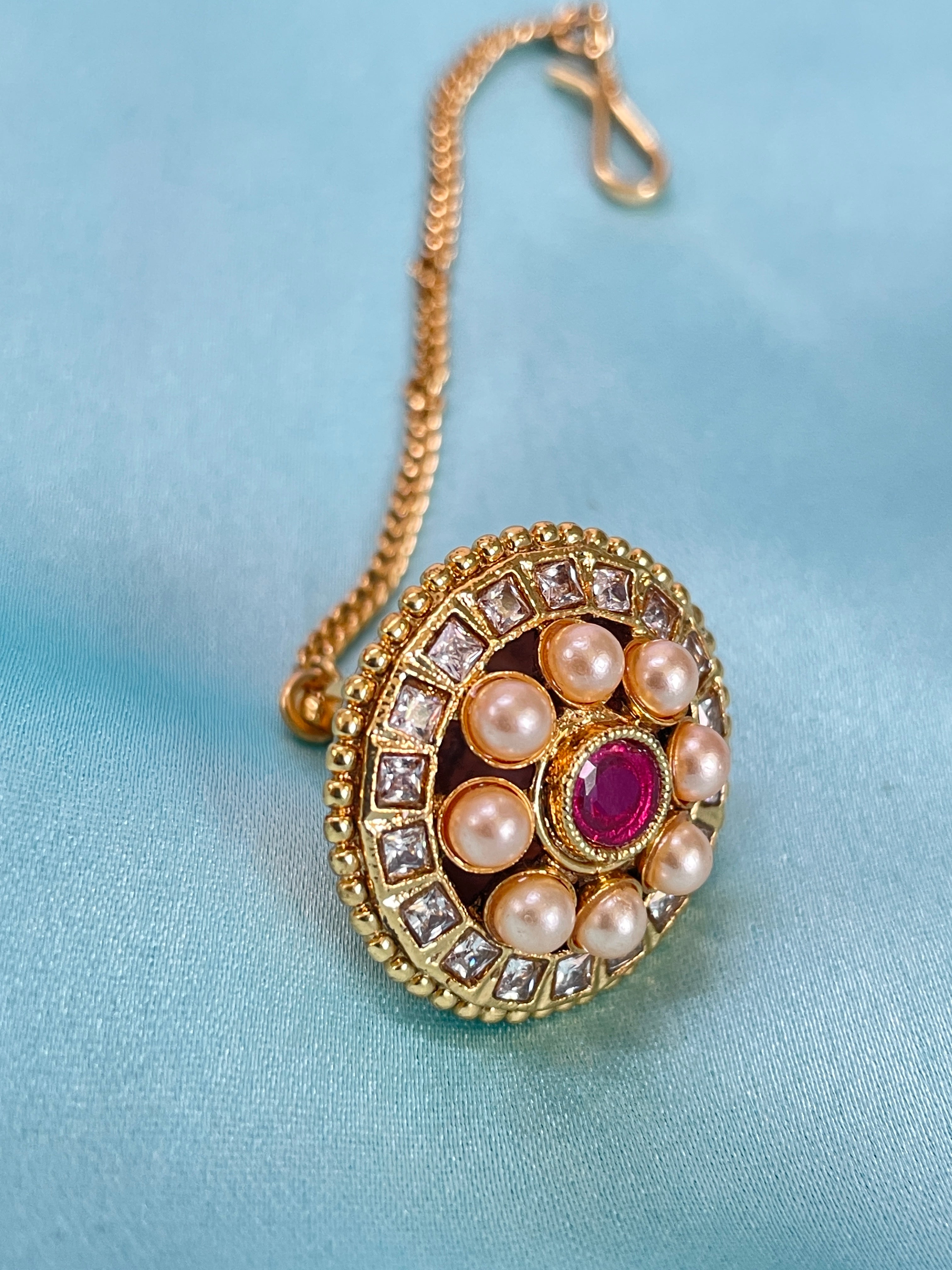 Elegant Round Kundan Pearl Maang Tikka with Ruby Centerpiece