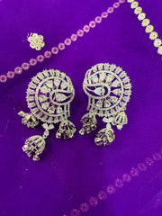 Stunning chandelier-style drop earrings featuring pink quartz stones surrounded by brilliant cubic zirconia in a sophisticated fan pattern